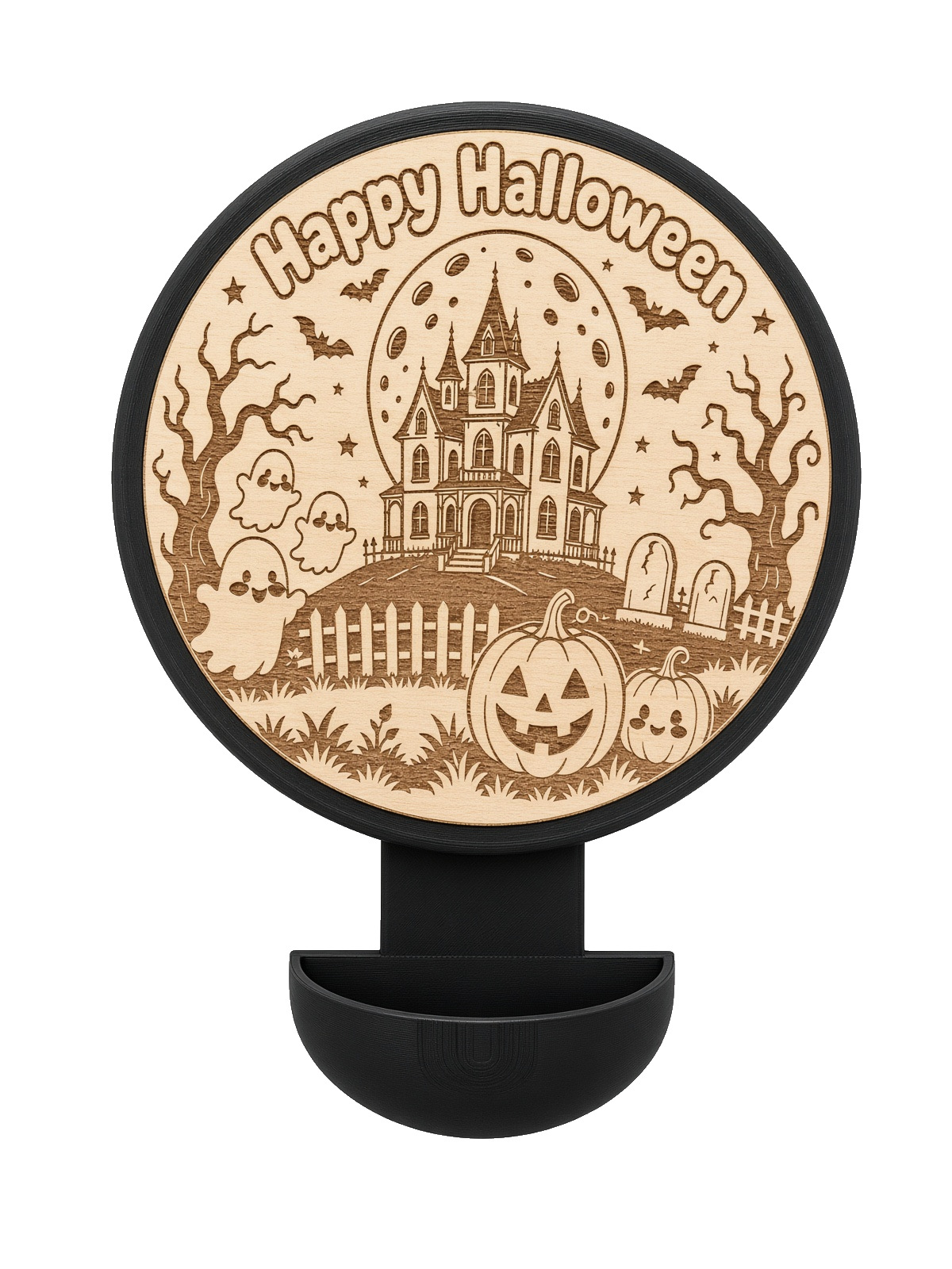 Halloween candy dispenser with a laser-engraved basswood scene in a black 3D-printed frame and holder