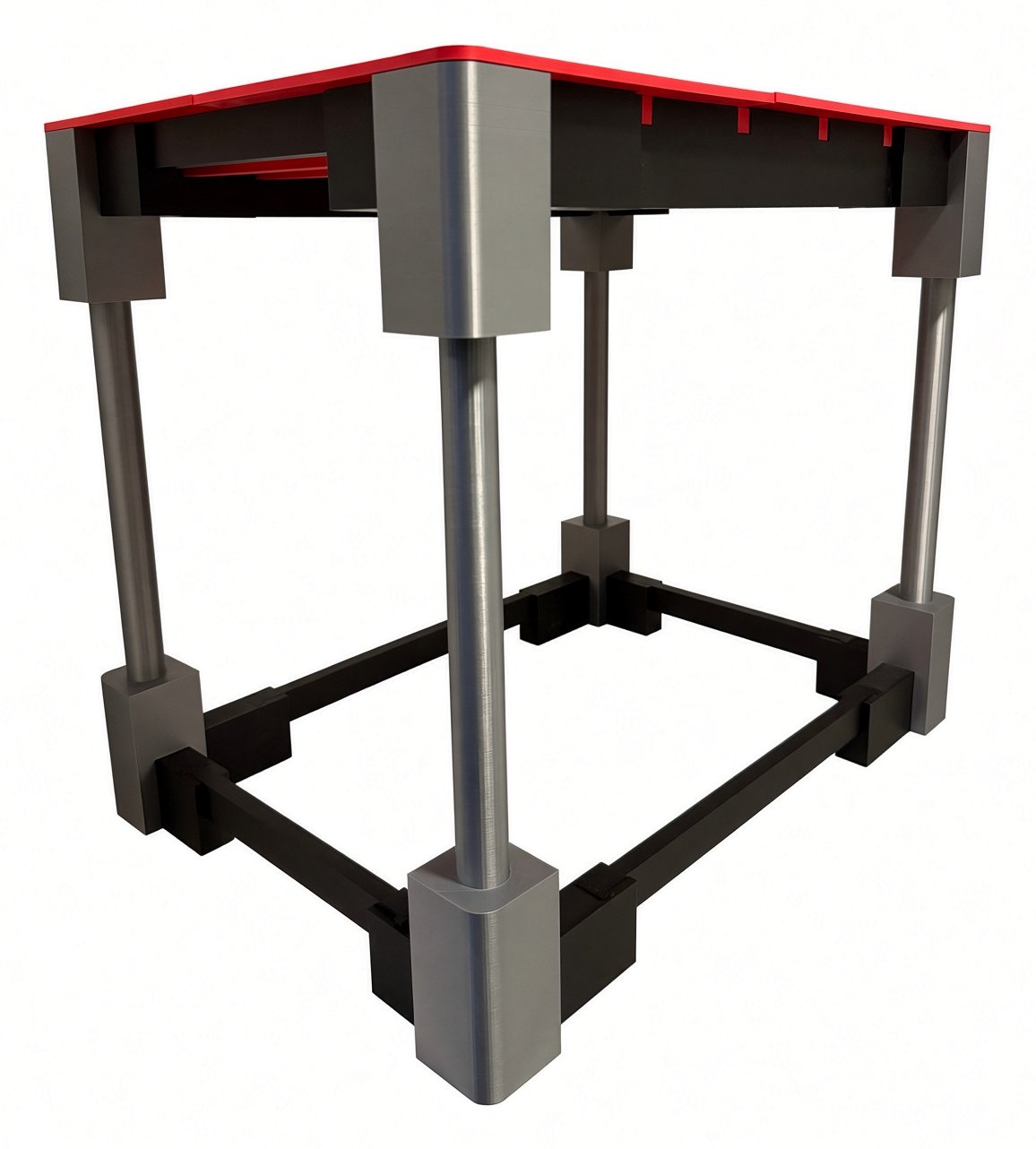 3D-printed table with a red top, dark frame, and silver legs